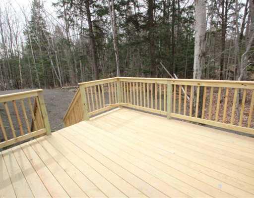 40 Autumn Ridge Road Cumberland Center, ME 04021 - Photo 17 of 17 Patio/Deck. large deck overlooking a...