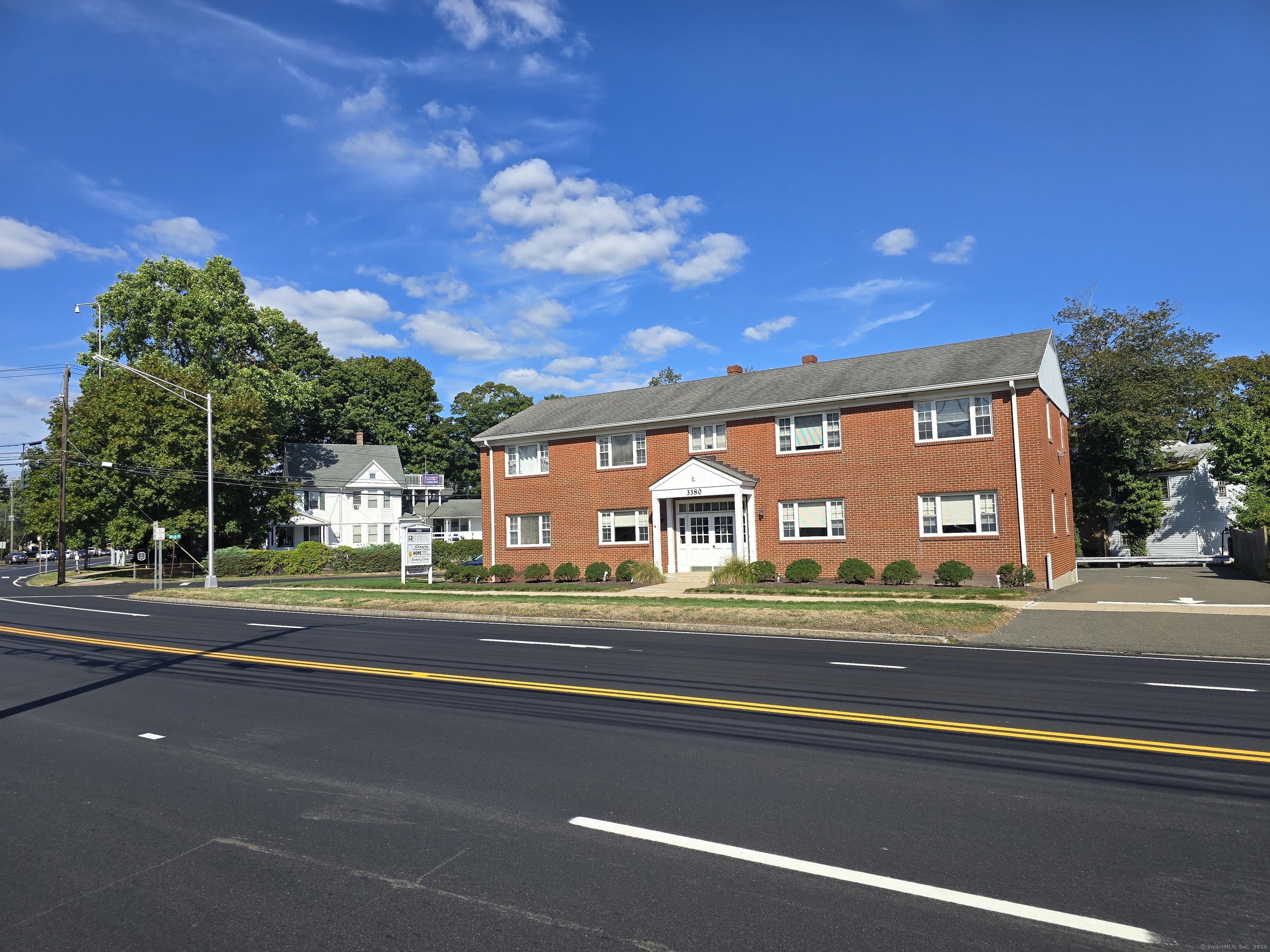 a view of street with a houses