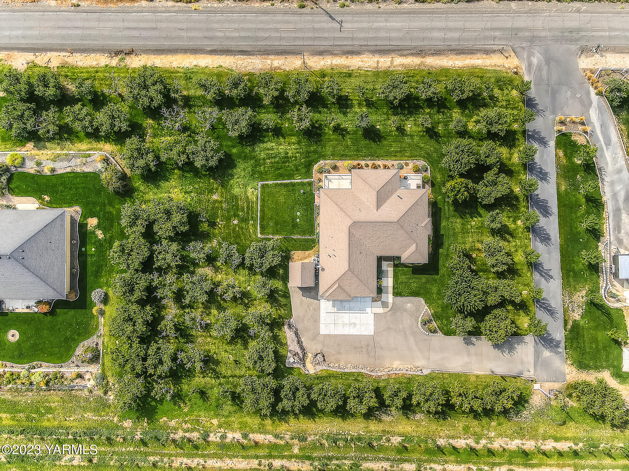 893 Charvet Road Grandview, WA 98930 - Photo 2 of 44 an aerial view of a house with a yard