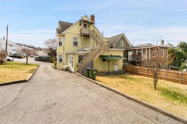 a view of a house with swimming pool