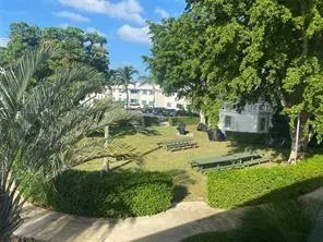 a view of a yard in front of house