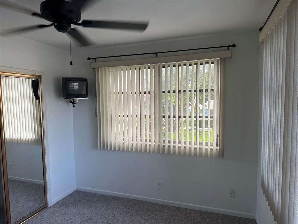 1821 Northeast 62nd Street, Unit 432 Fort Lauderdale, FL 33308 - Photo 13 of 29 a view of a black and white wall