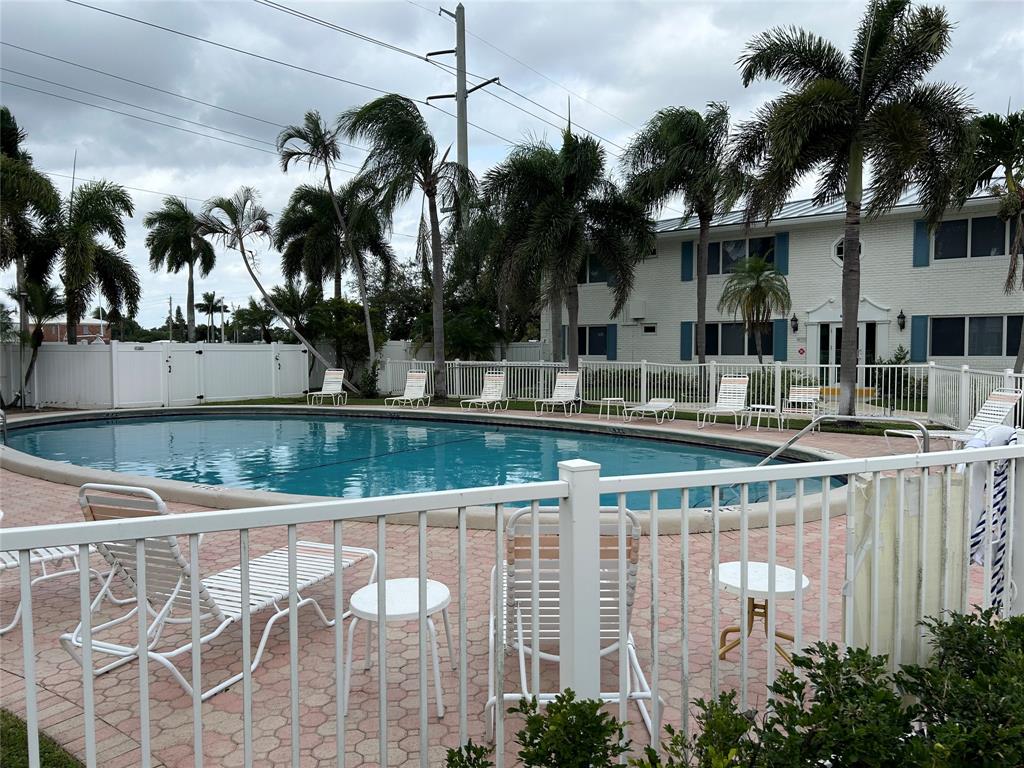 1821 Northeast 62nd Street, Unit 432 Fort Lauderdale, FL 33308 - Photo 19 of 29 a house view with a lake view