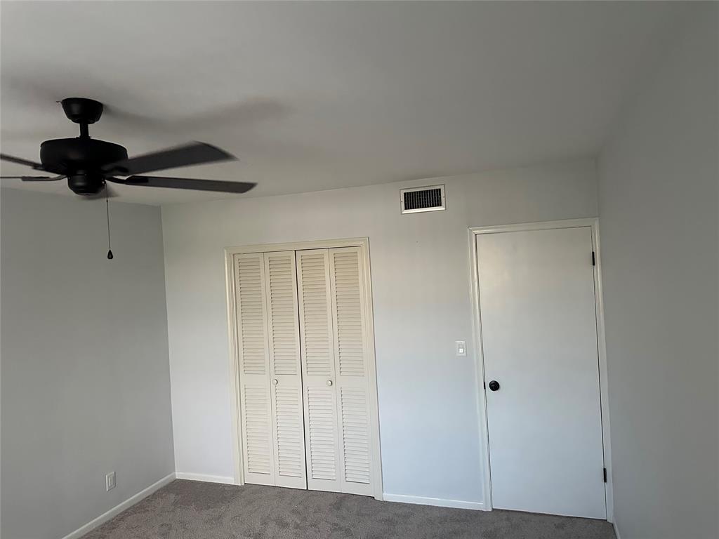 1821 Northeast 62nd Street, Unit 432 Fort Lauderdale, FL 33308 - Photo 4 of 29 a view of a hallway