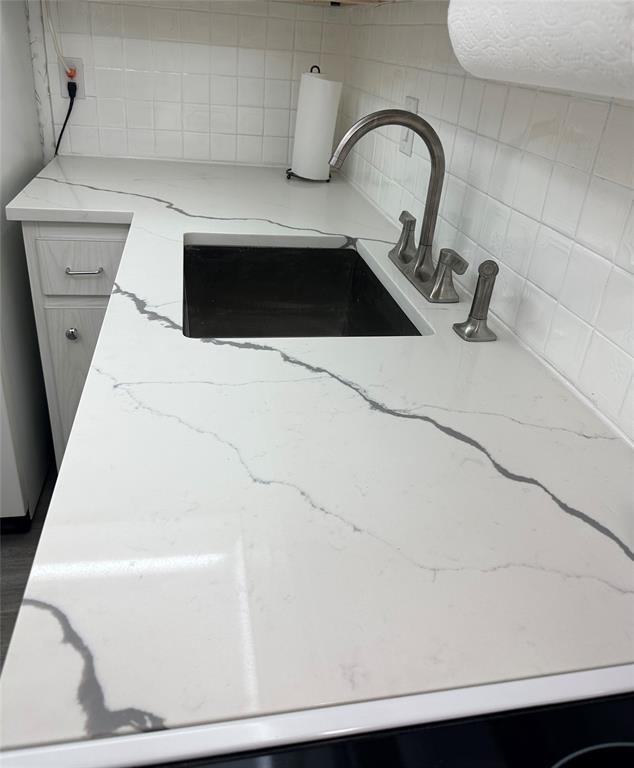 1821 Northeast 62nd Street, Unit 432 Fort Lauderdale, FL 33308 - Photo 8 of 29 a close view of a sink in a bathroom