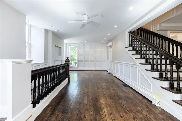 a view of entryway with wooden floor