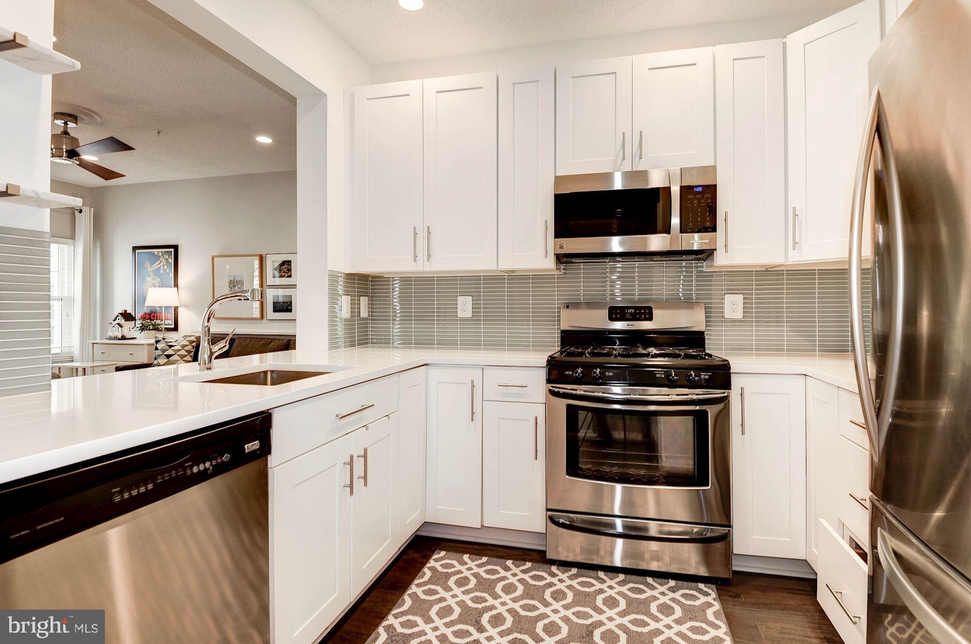 12016 Taliesin Place, Unit 22 Reston, VA 20190 - Photo 8 of 30 Remodeled Kitchen w/SS Appliances