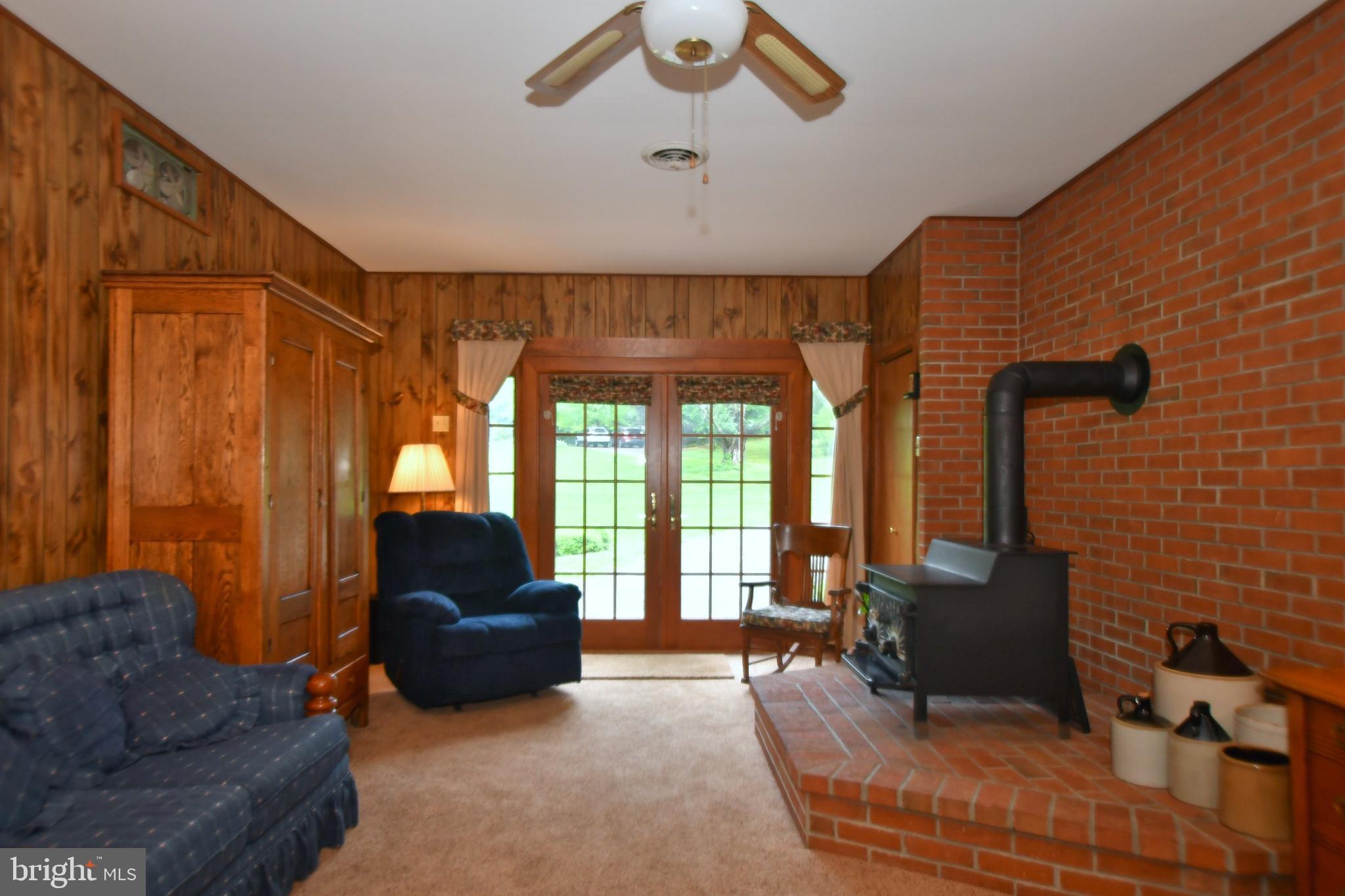 3620 Miller Road Street, MD 21154 - Photo 31 of 50 Floor to ceiling raised hearth with wood stove