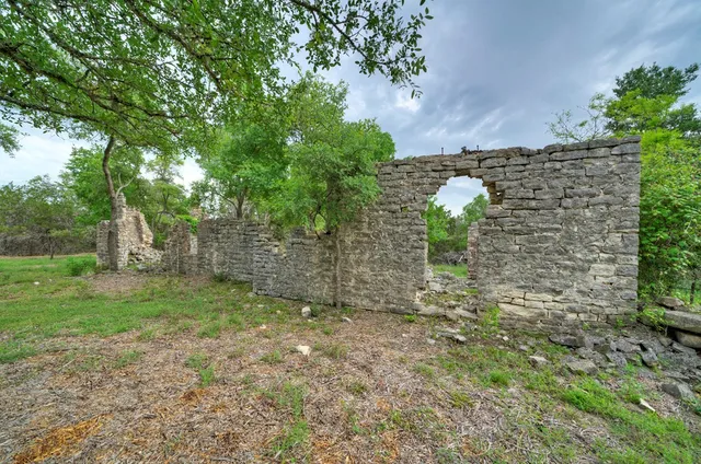 a backyard of a house with lots of green space