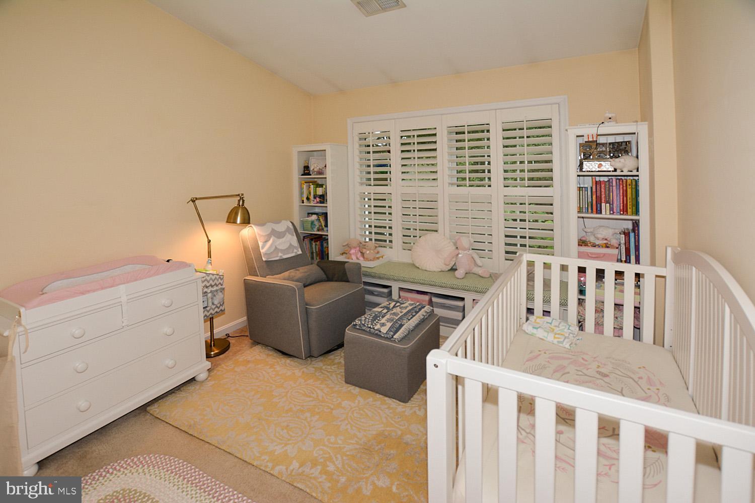11268 Fairwind Way Reston, VA 20190 - Photo 22 of 51 Built-in bookshelves and window seat