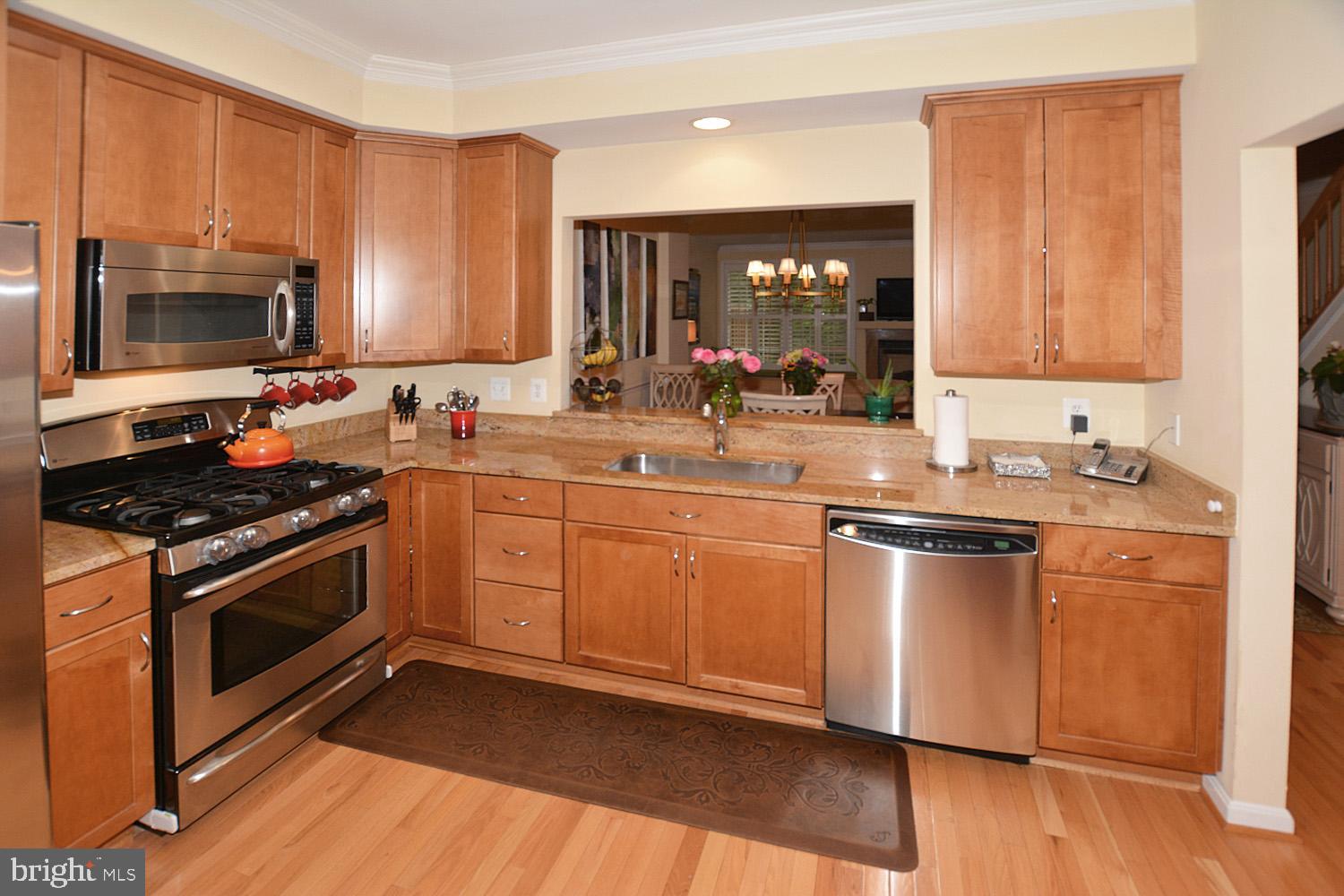 11268 Fairwind Way Reston, VA 20190 - Photo 6 of 51 Kitchen open to dinning & living room