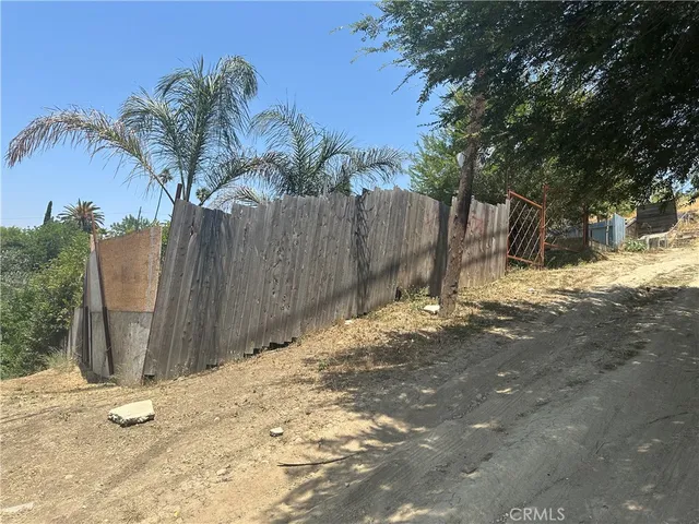 a view of a backyard of a house