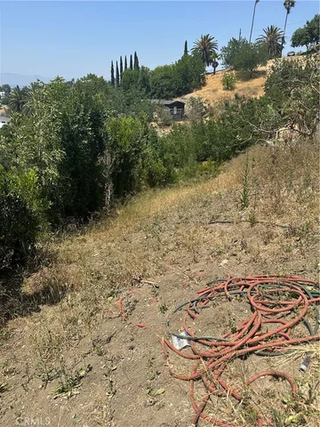 a view of a yard with an outdoor space