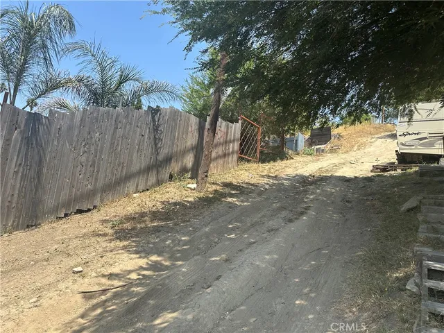 a view of a yard with an outdoor space