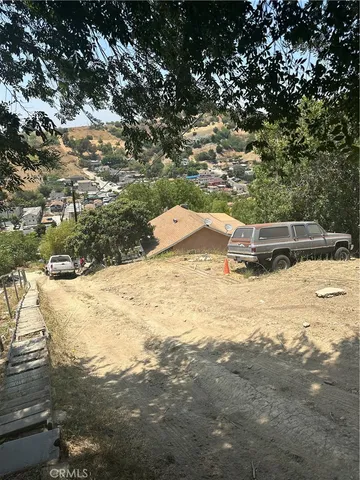 a view of a yard with an outdoor space
