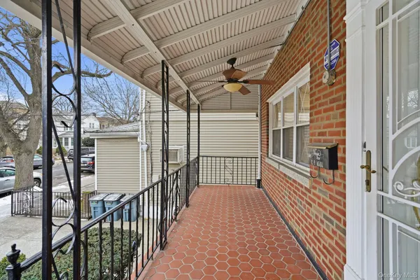 a view of a balcony with city view