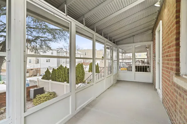 a view of a glass door with a balcony