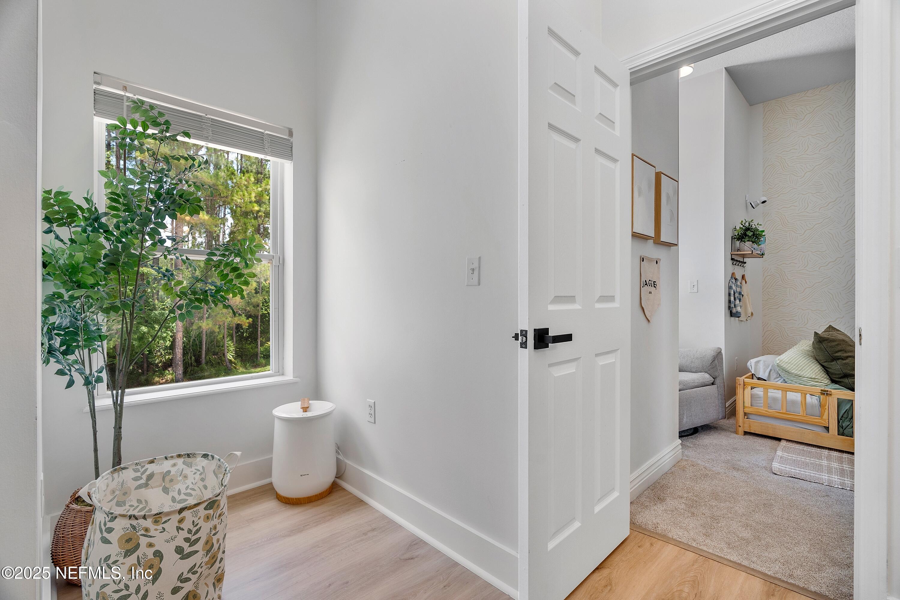 201 Burghley Avenue St. Augustine, FL 32092 - Photo 51 of 75 Heading Into Bedroom