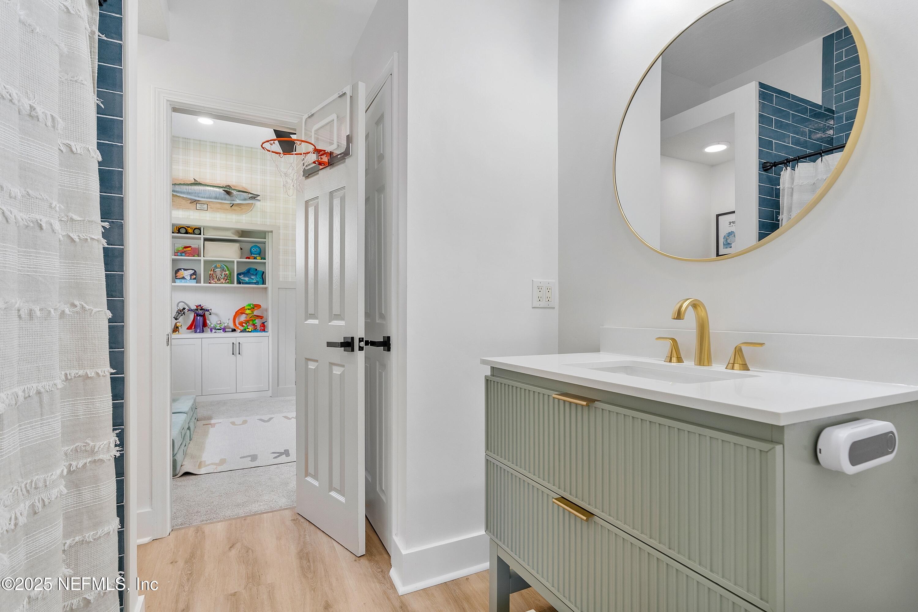 201 Burghley Avenue St. Augustine, FL 32092 - Photo 65 of 75 a utility room with cabinets washer and dryer