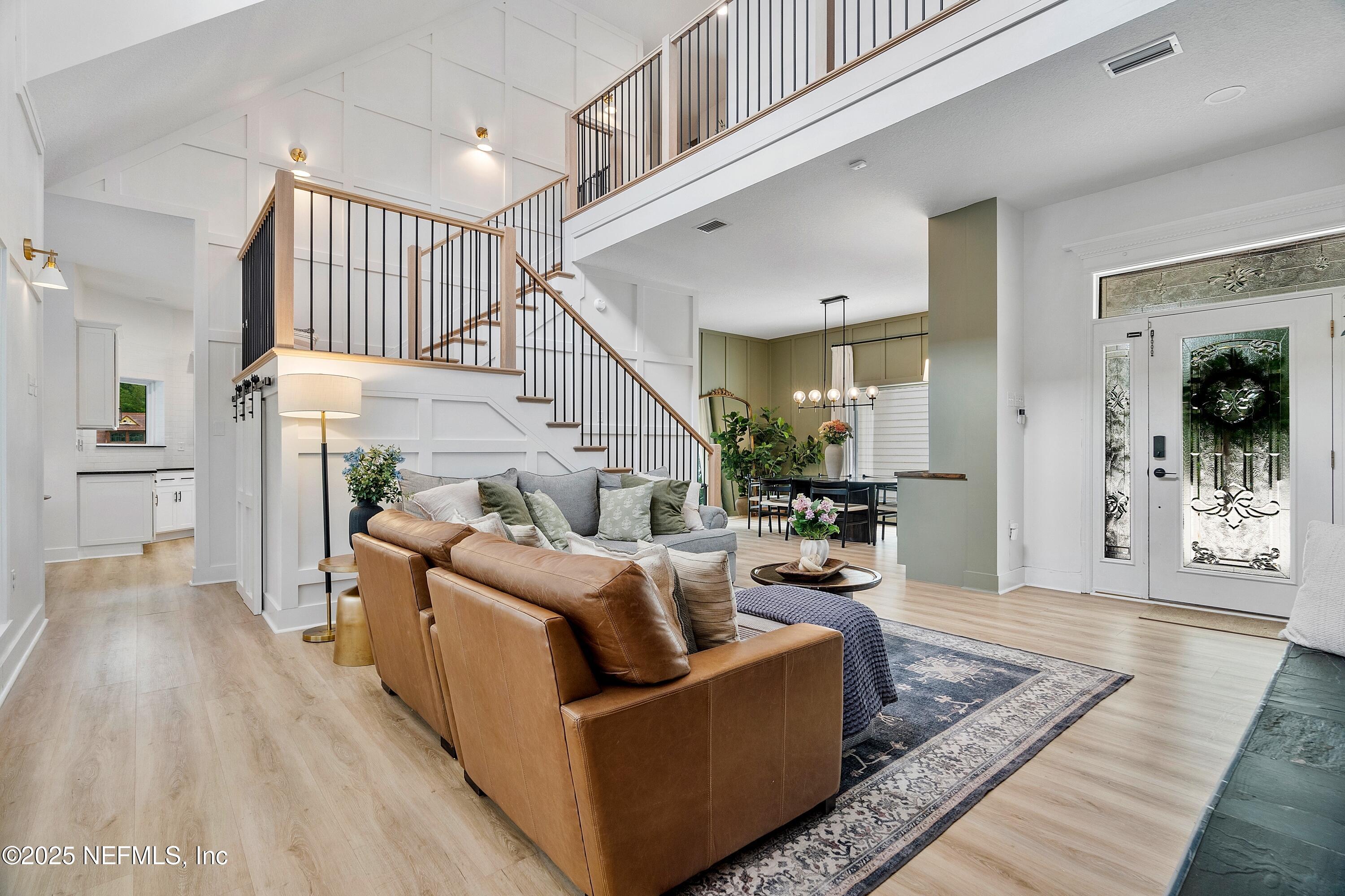 201 Burghley Avenue St. Augustine, FL 32092 - Photo 9 of 75 a living room with furniture and a wooden floor