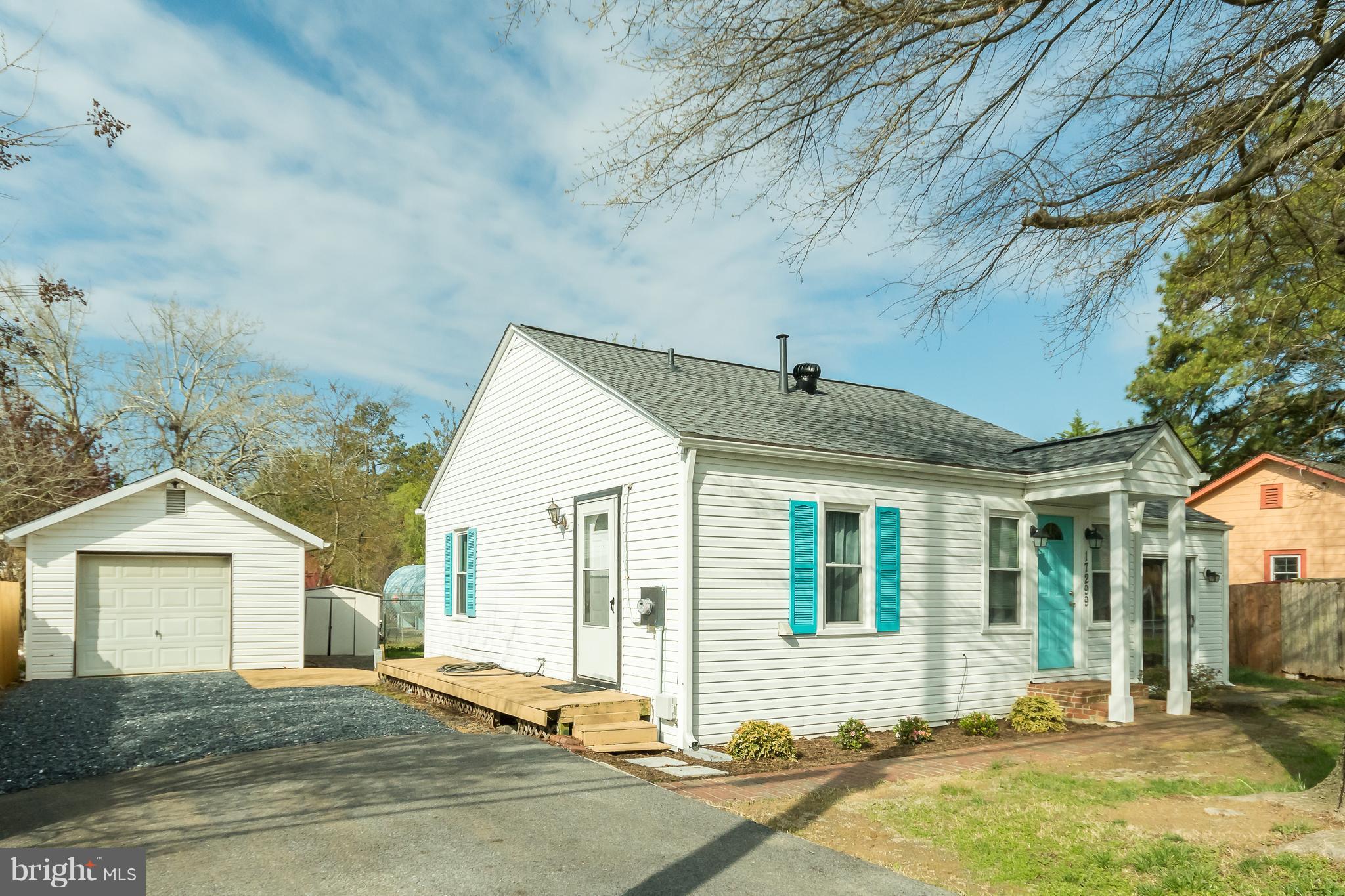 17299 Piney Point Road Piney Point, MD 20674 - Photo 2 of 16 Side view with detached 1 car garage.