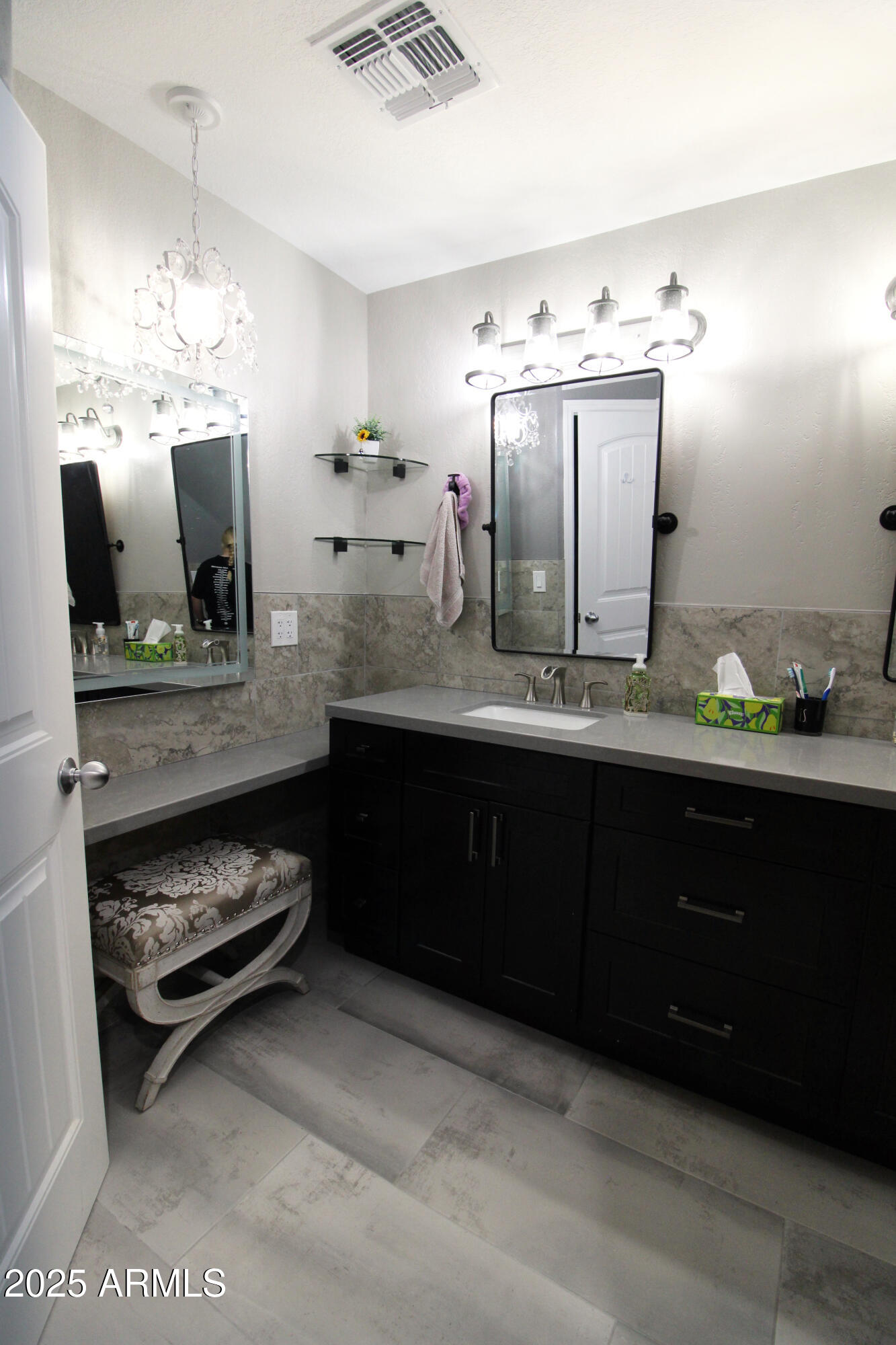 7732 West Wagoner Road Glendale, AZ 85308 - Photo 20 of 30 a bathroom with a double vanity sink and a mirror