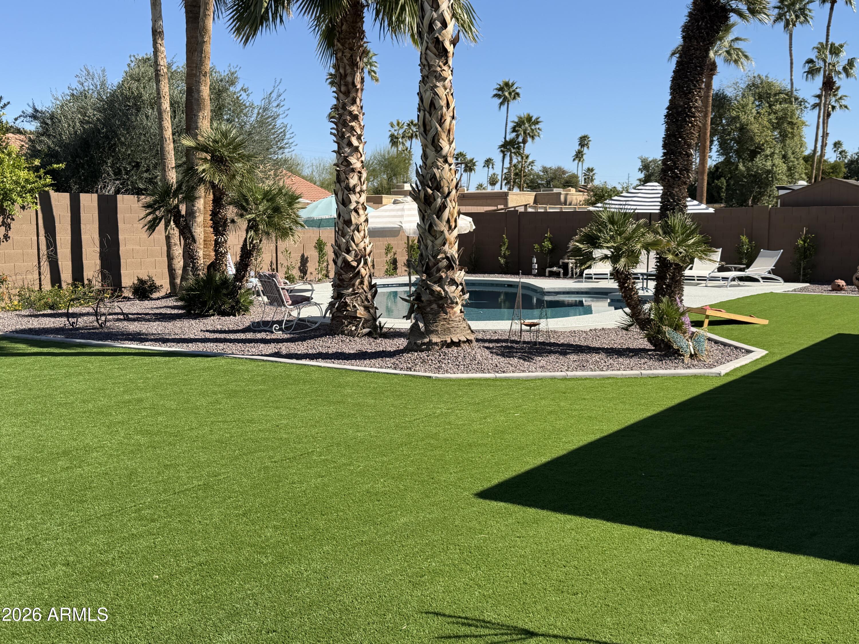7732 West Wagoner Road Glendale, AZ 85308 - Photo 2 of 41 a view of a park with tree s