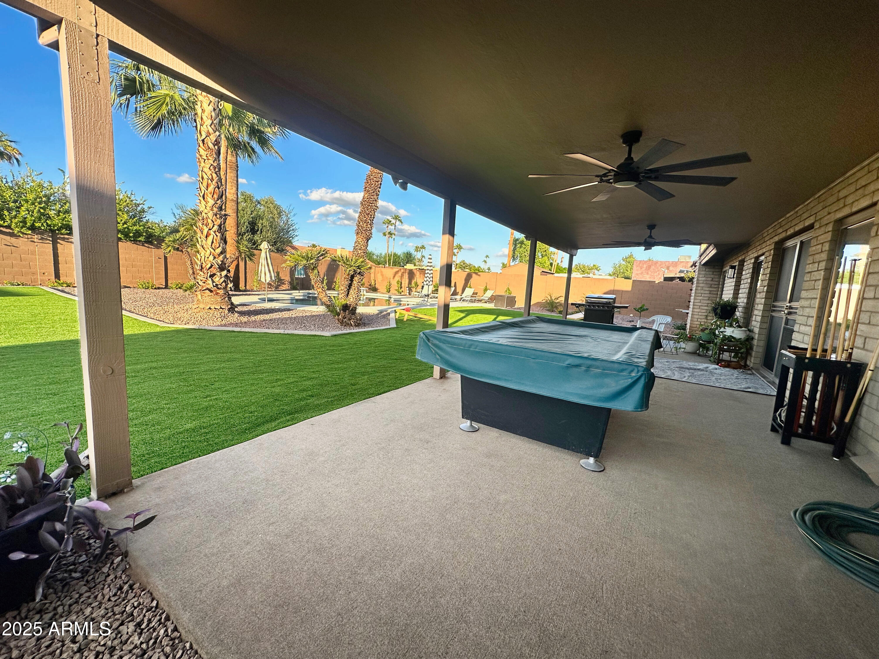 7732 West Wagoner Road Glendale, AZ 85308 - Photo 25 of 30 a park with large trees and outdoor seating