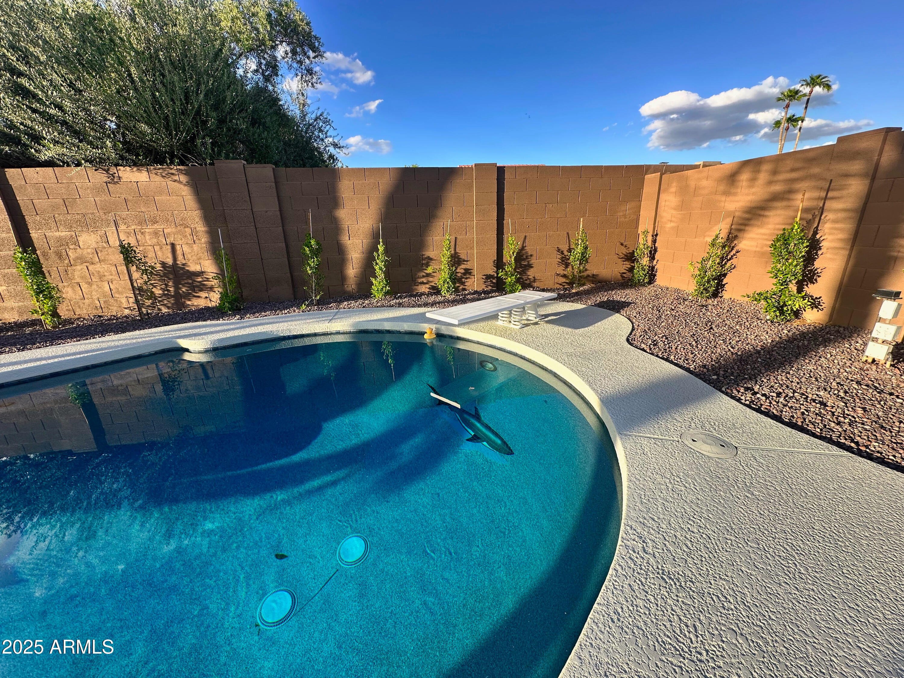 7732 West Wagoner Road Glendale, AZ 85308 - Photo 29 of 30 a bathroom with a sink mirror and window