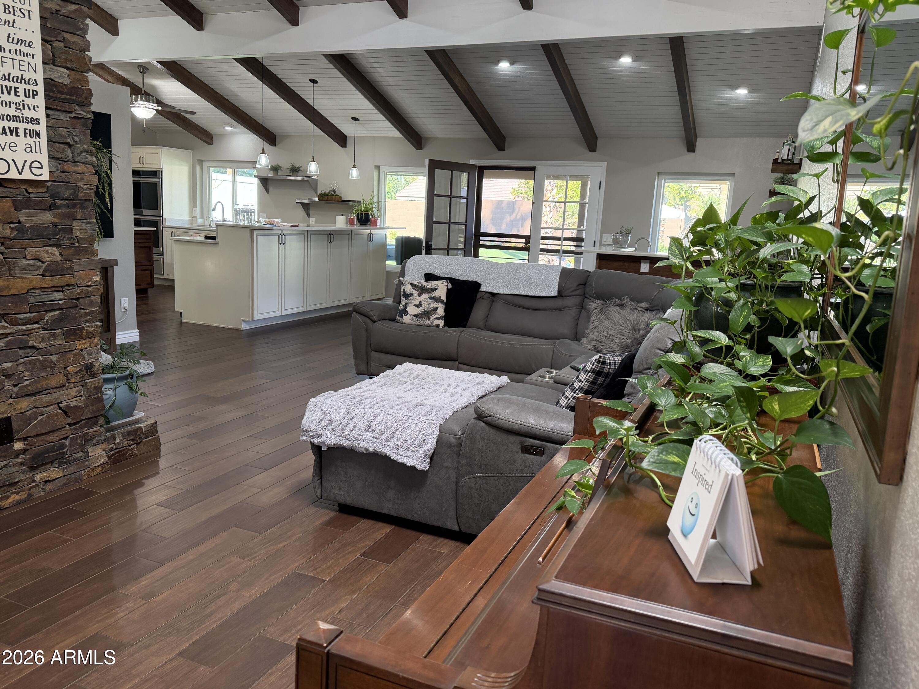 7732 West Wagoner Road Glendale, AZ 85308 - Photo 34 of 41 a living room with furniture and a potted plant