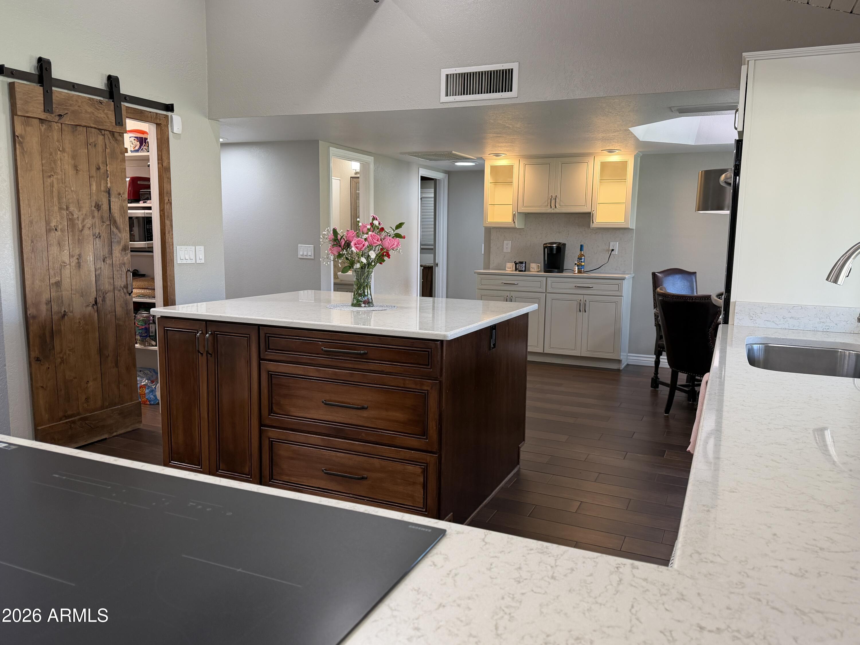 7732 West Wagoner Road Glendale, AZ 85308 - Photo 37 of 41 a bathroom with a sink vanity granite tub and shower