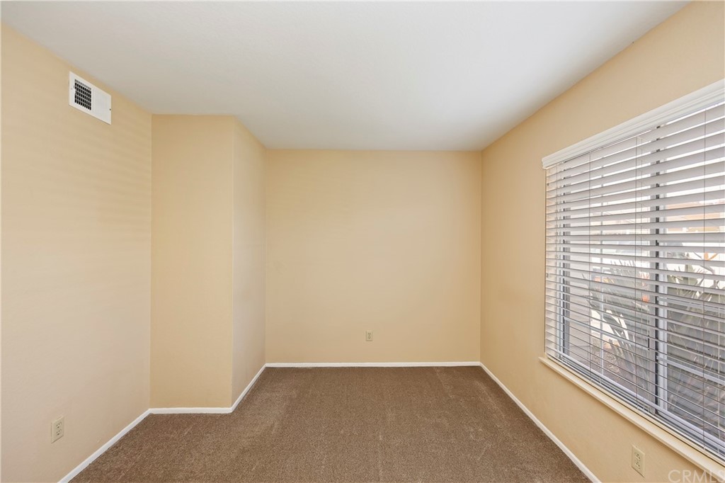 3534 Broken Feather Drive Norco, CA 92860 - Photo 15 of 33 a view of an empty room with a window