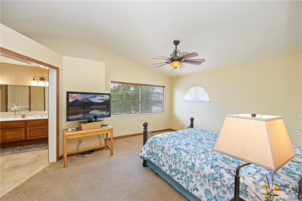 3534 Broken Feather Drive Norco, CA 92860 - Photo 18 of 33 a living room with furniture and a flat screen tv