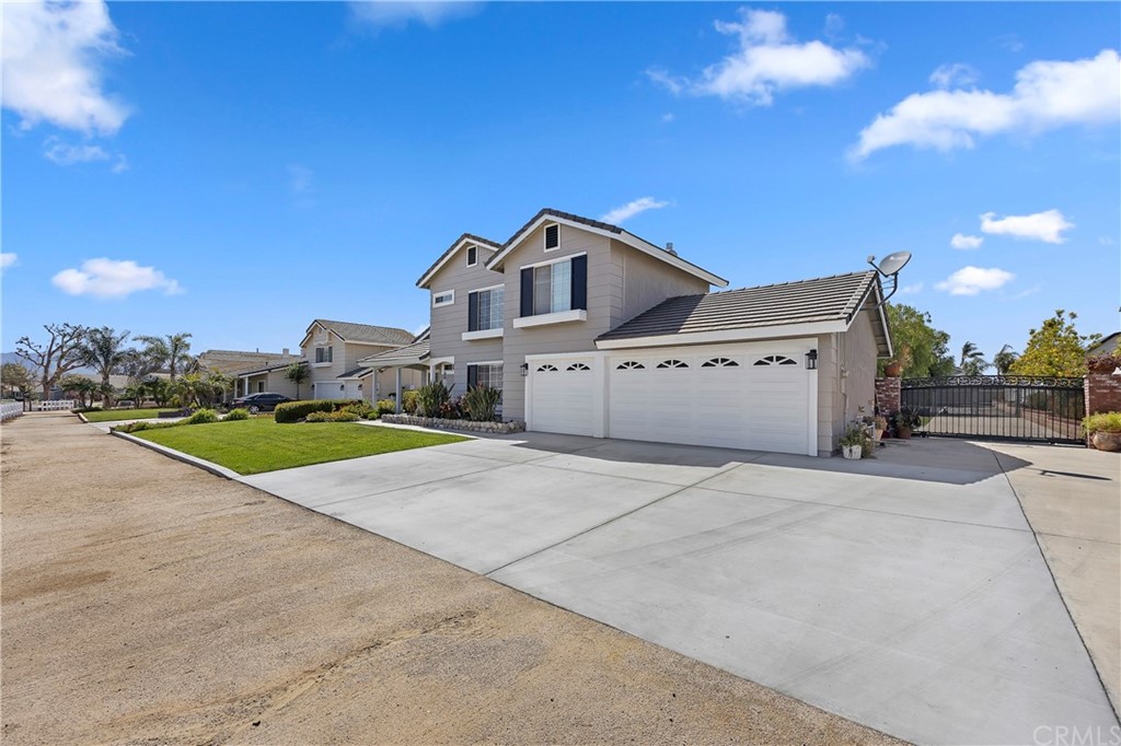 3534 Broken Feather Drive Norco, CA 92860 - Photo 3 of 33 a house with a yard in front of it
