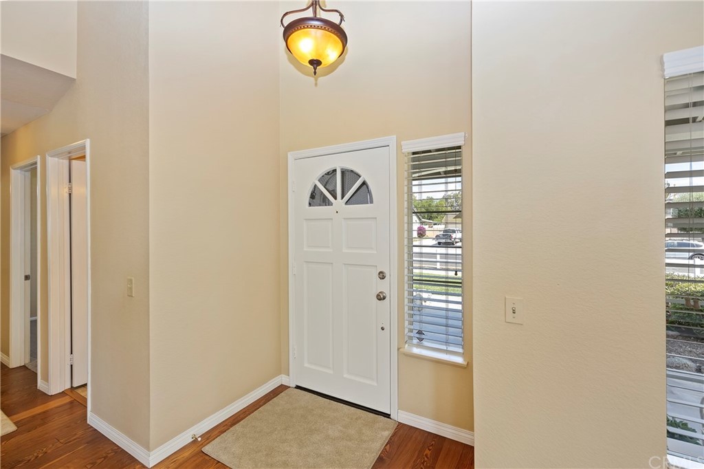 3534 Broken Feather Drive Norco, CA 92860 - Photo 6 of 33 an entryway view with wooden floor