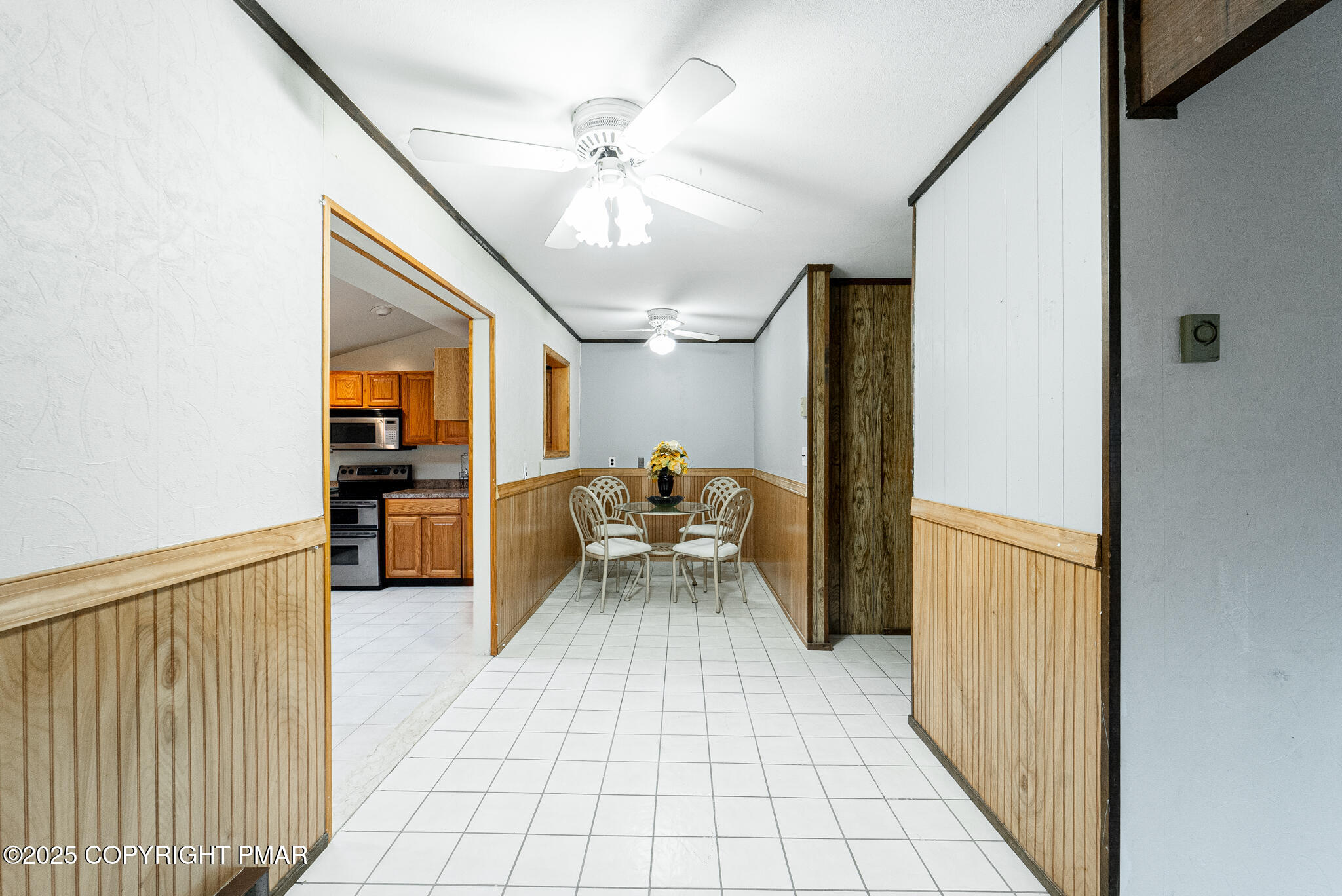 6147 Decker Road Bushkill, PA 18324 - Photo 12 of 49 a view of kitchen with furniture and a chandelier