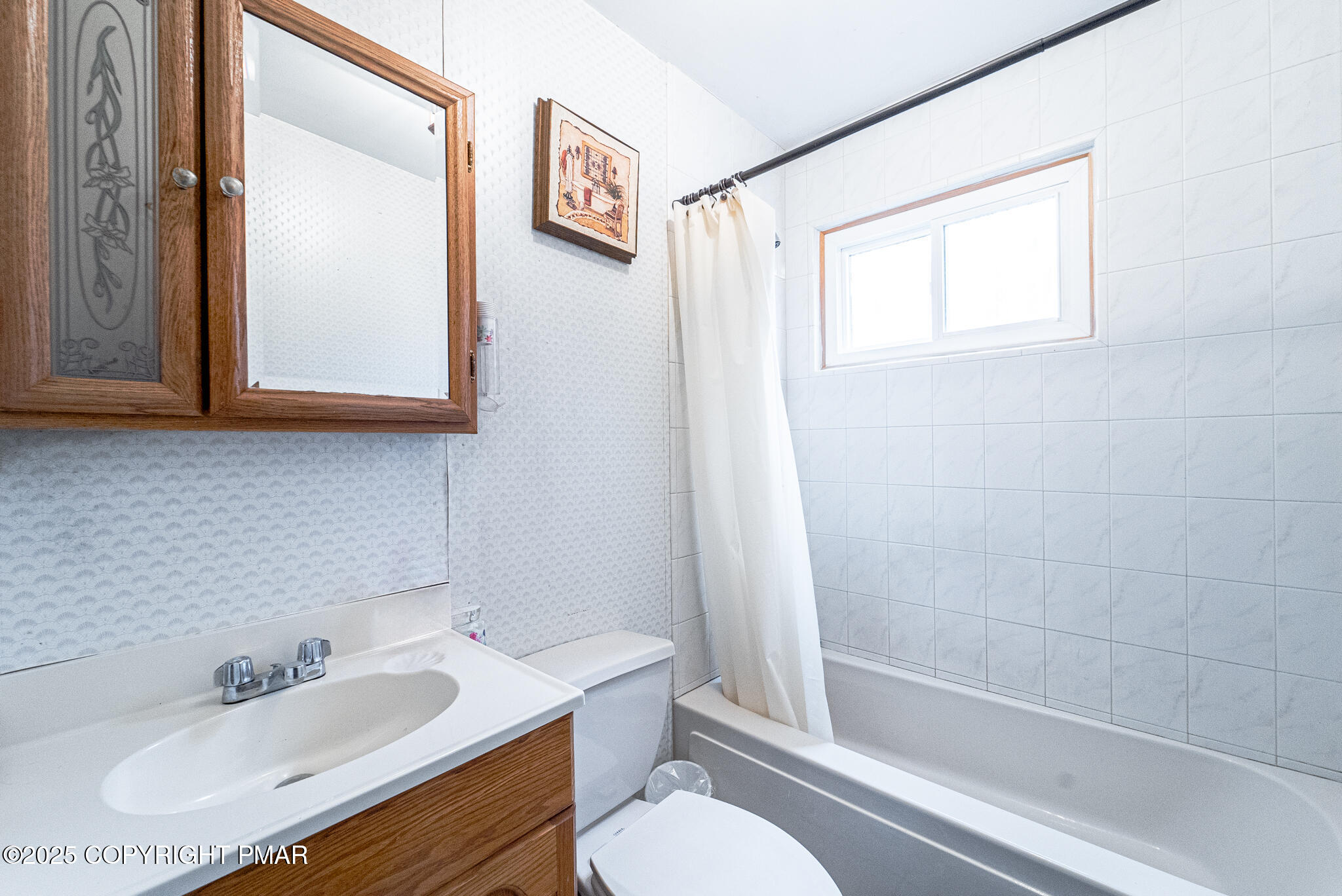 6147 Decker Road Bushkill, PA 18324 - Photo 23 of 49 a bathroom with a sink and a mirror