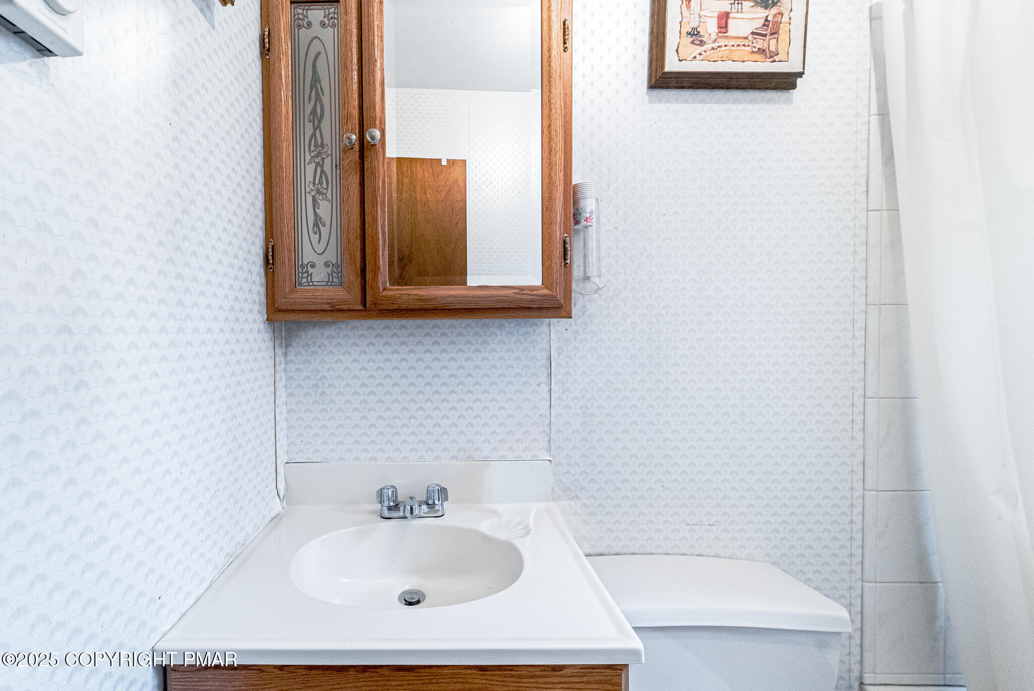 6147 Decker Road Bushkill, PA 18324 - Photo 24 of 49 a bathroom with a sink and a mirror