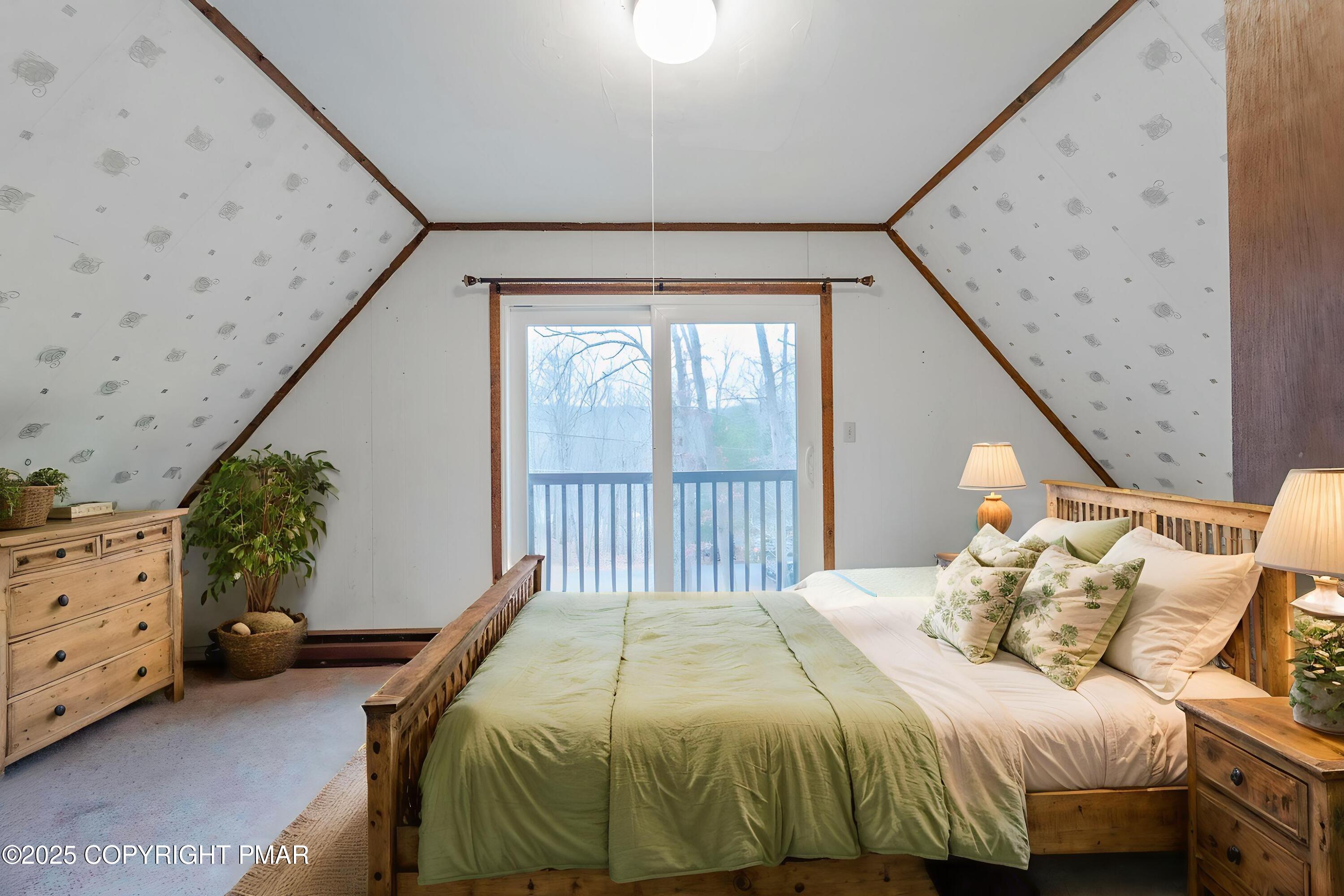 6147 Decker Road Bushkill, PA 18324 - Photo 27 of 49 a bedroom with a bed and a window