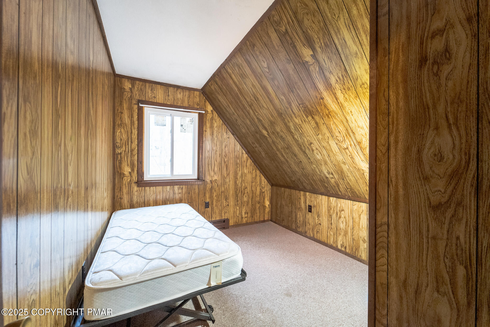 6147 Decker Road Bushkill, PA 18324 - Photo 32 of 49 a bedroom with a bed and a window