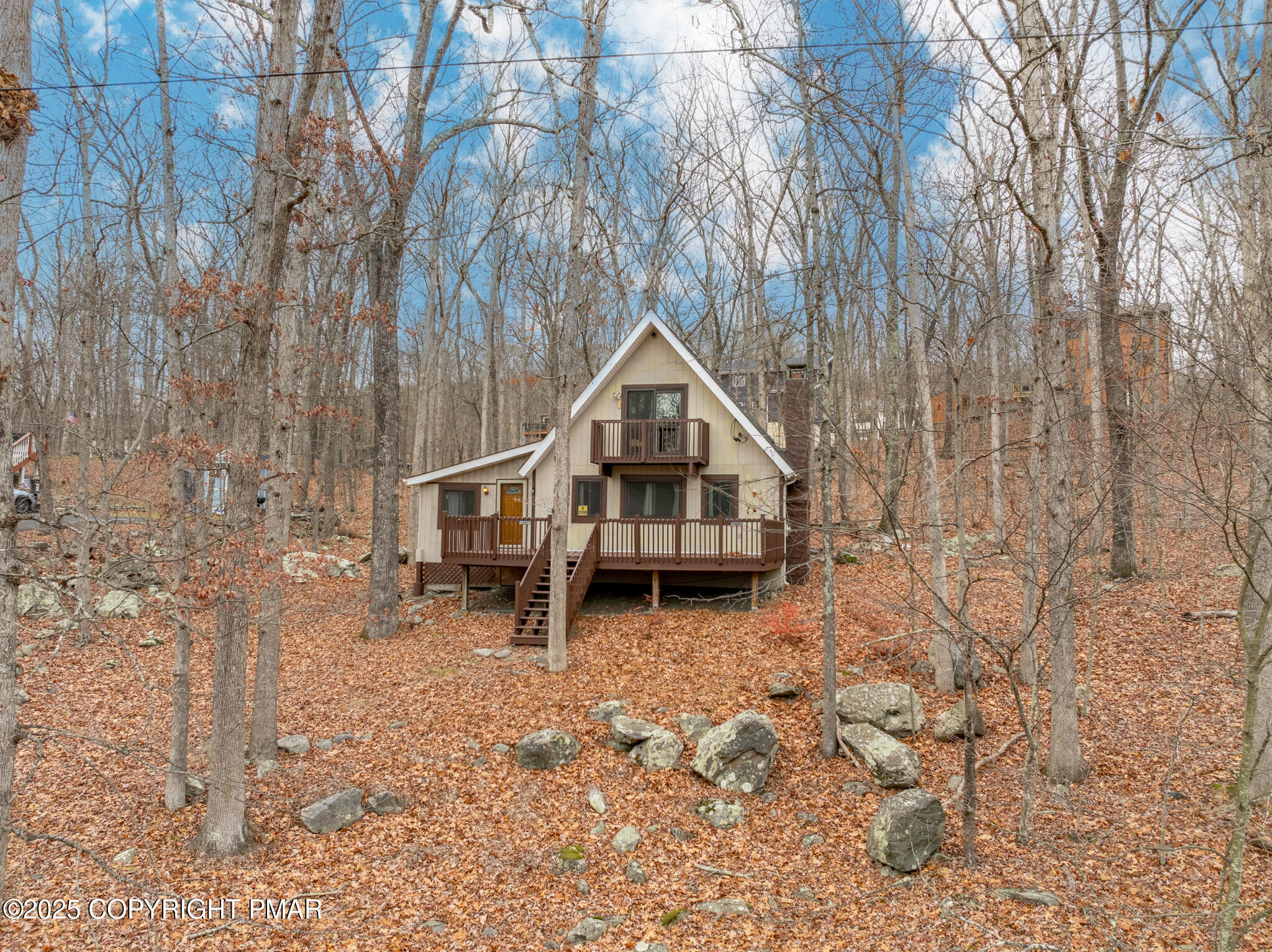 6147 Decker Road Bushkill, PA 18324 - Photo 38 of 49 a house with trees in front of it