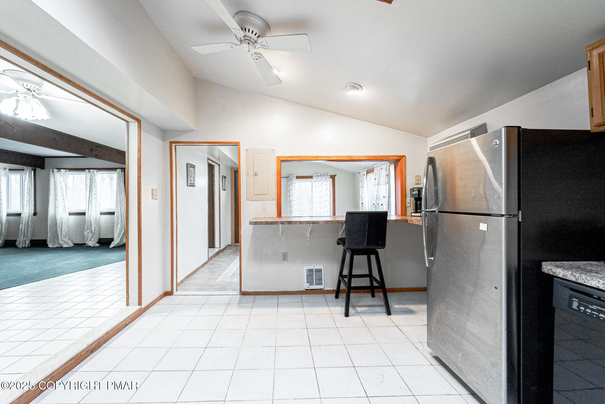6147 Decker Road Bushkill, PA 18324 - Photo 7 of 49 a view of a livingroom with furniture and a ceiling fan