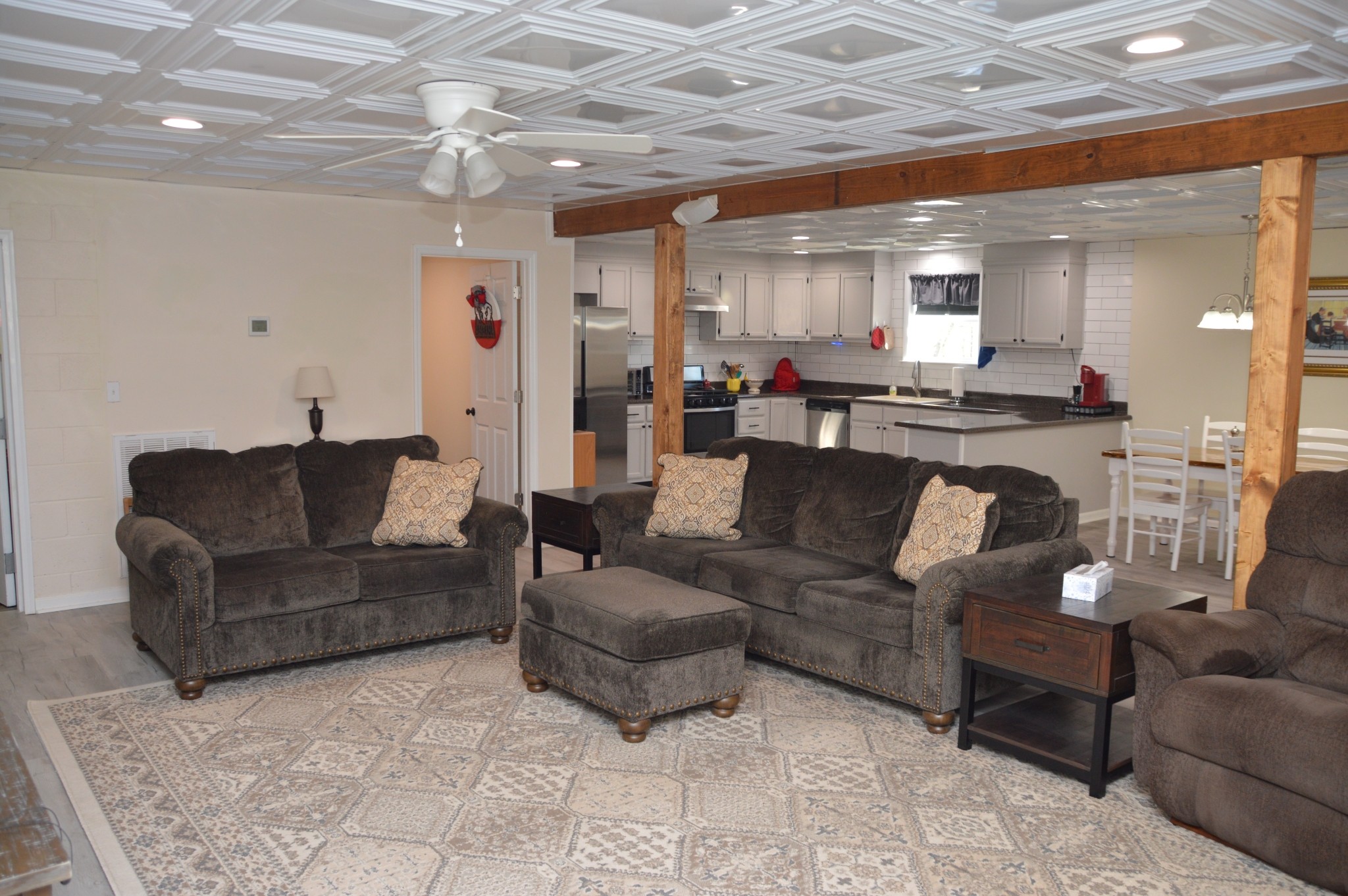 351 Hurricane Creek Road Linden, TN 37096 - Photo 18 of 41 a living room with furniture and a large mirror with wooden floor