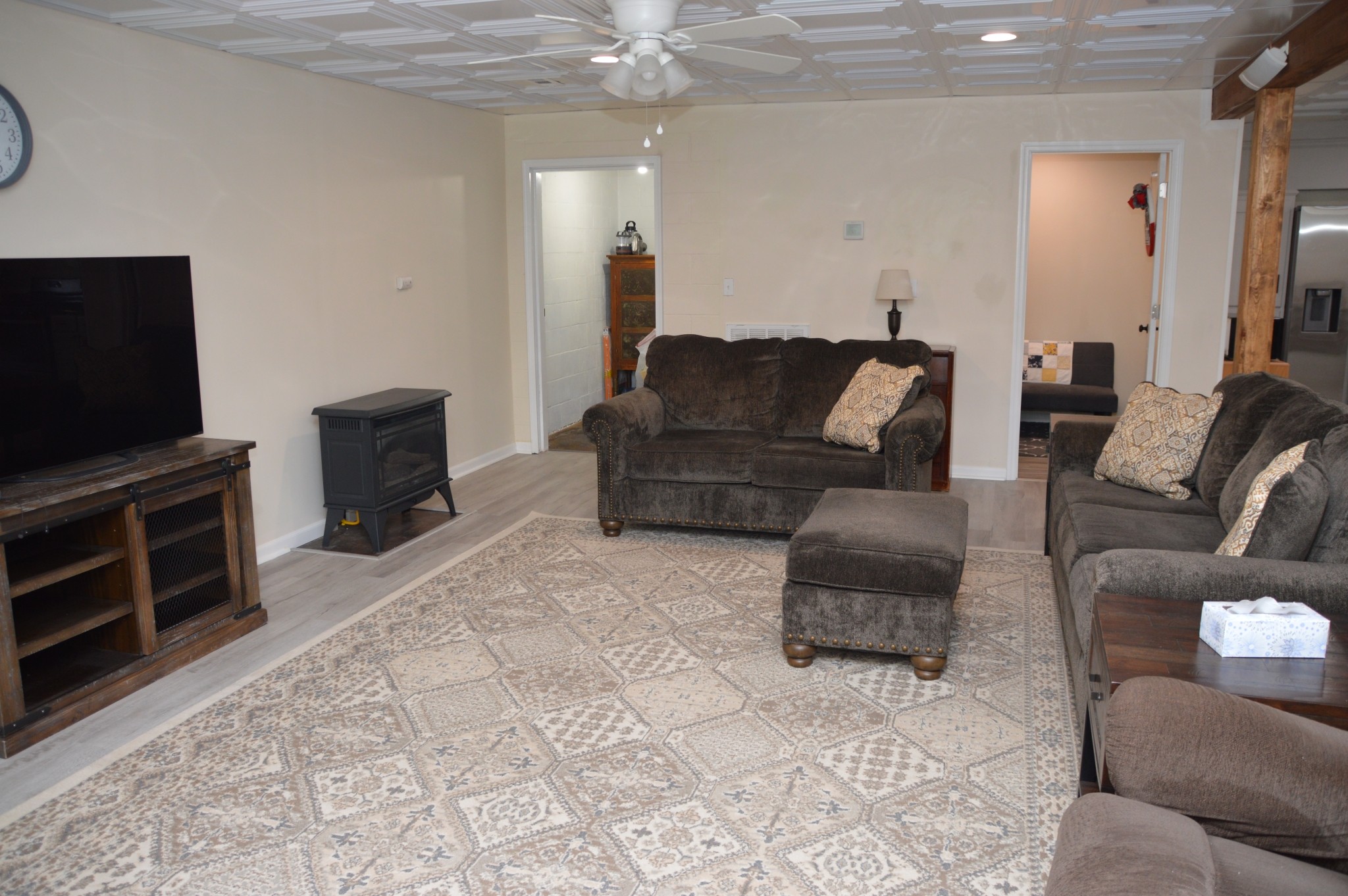 351 Hurricane Creek Road Linden, TN 37096 - Photo 19 of 41 a living room with furniture and a flat screen tv
