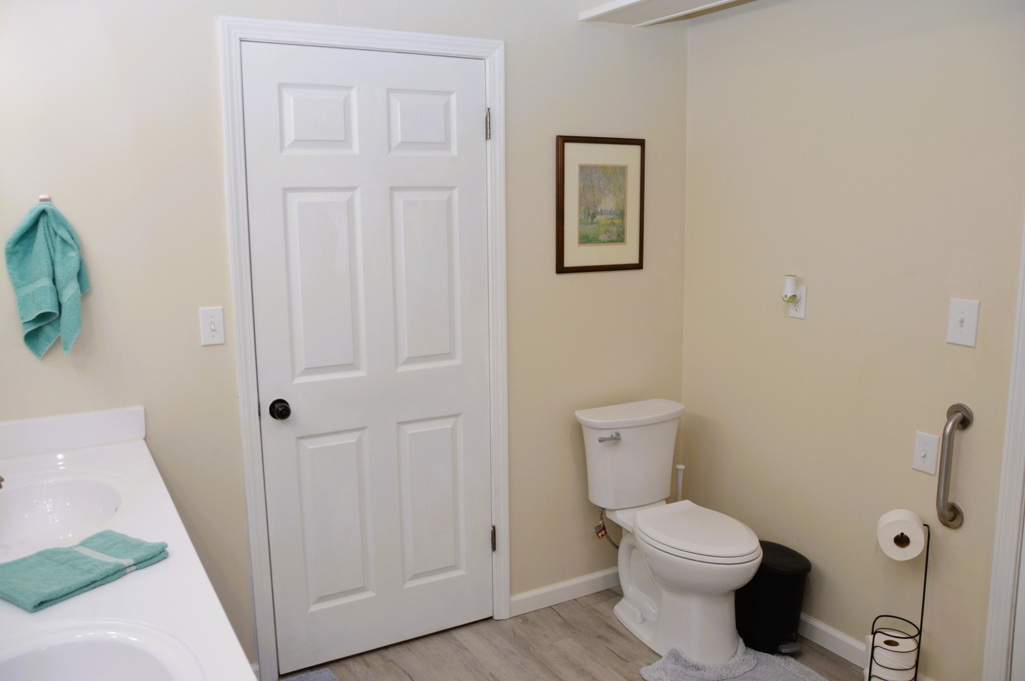 351 Hurricane Creek Road Linden, TN 37096 - Photo 28 of 41 a white toilet sitting next to a bathroom sink