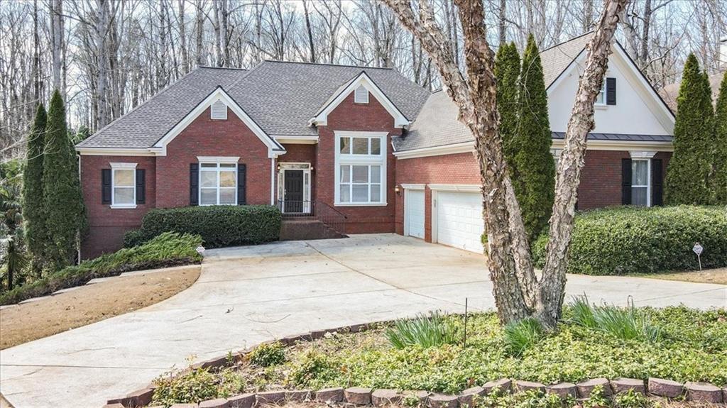 5564 Ridgemoor Drive Braselton, GA 30517 - Photo 1 of 1 a front view of a house with a yard