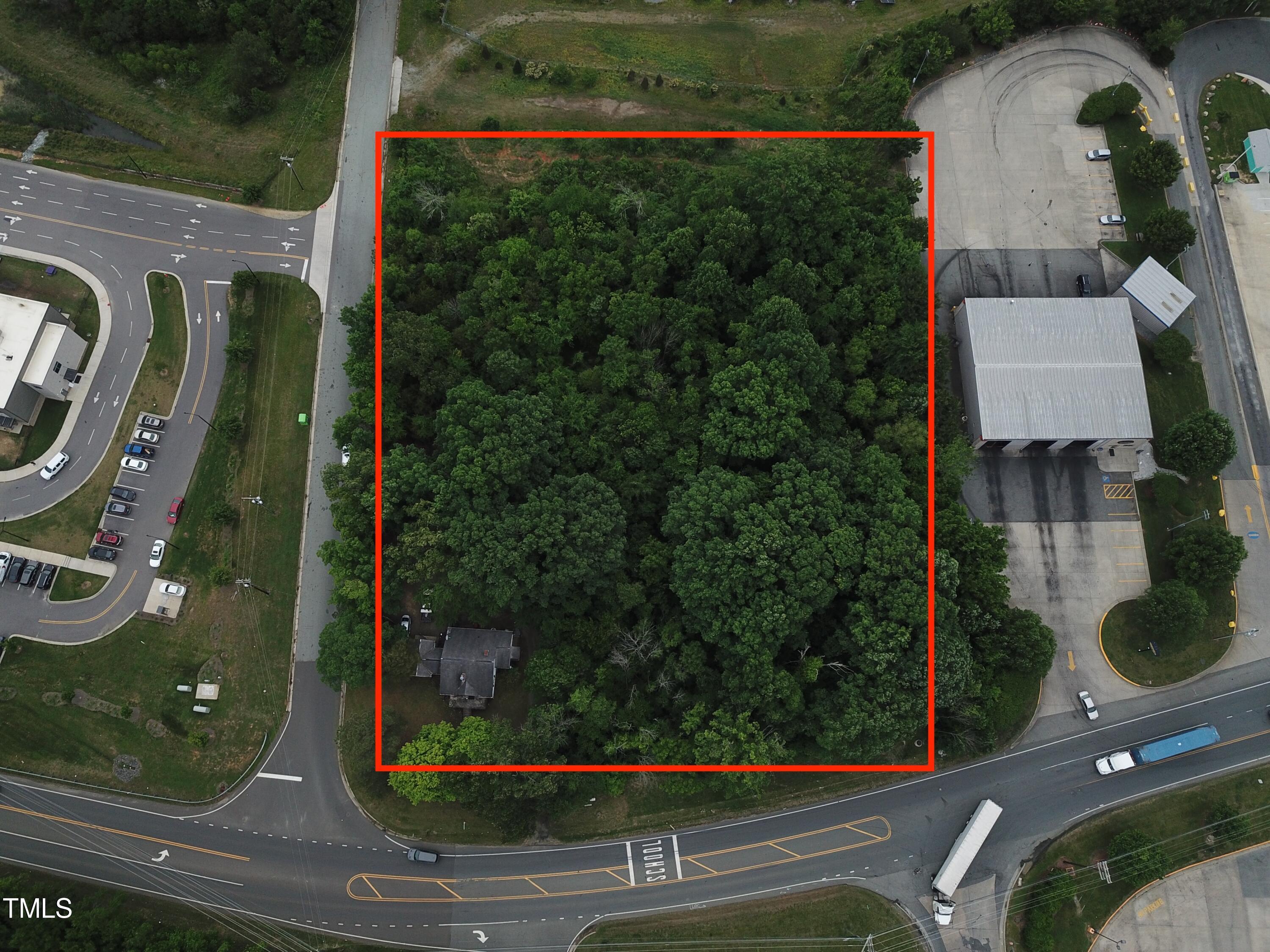 908 Jimmie Kerr Road Graham, NC 27258 - Photo 2 of 15 an aerial view of houses with yard
