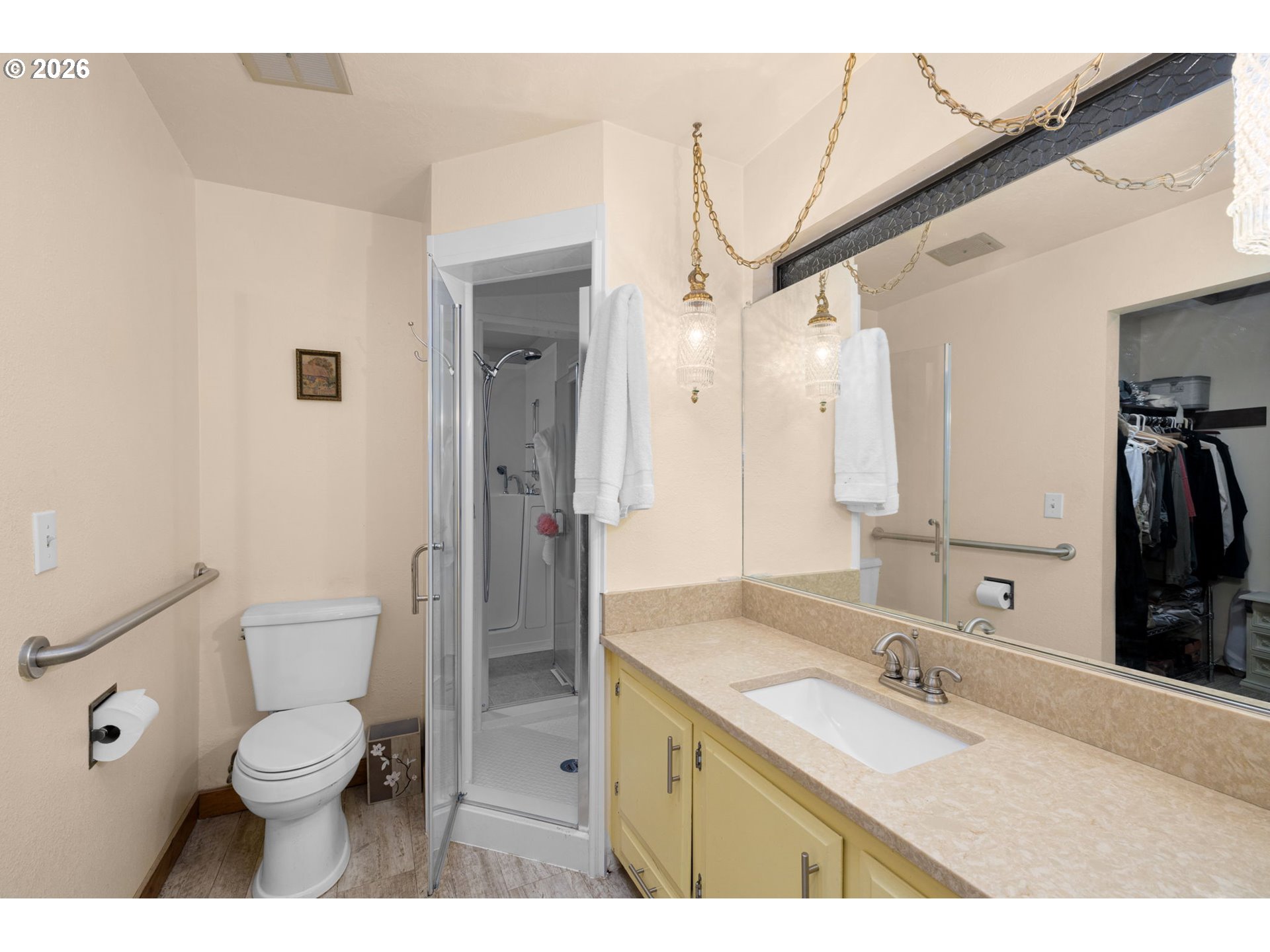 16020 Southeast Monner Road Happy Valley, OR 97086 - Photo 17 of 38 a bathroom with a granite countertop toilet sink and a mirror