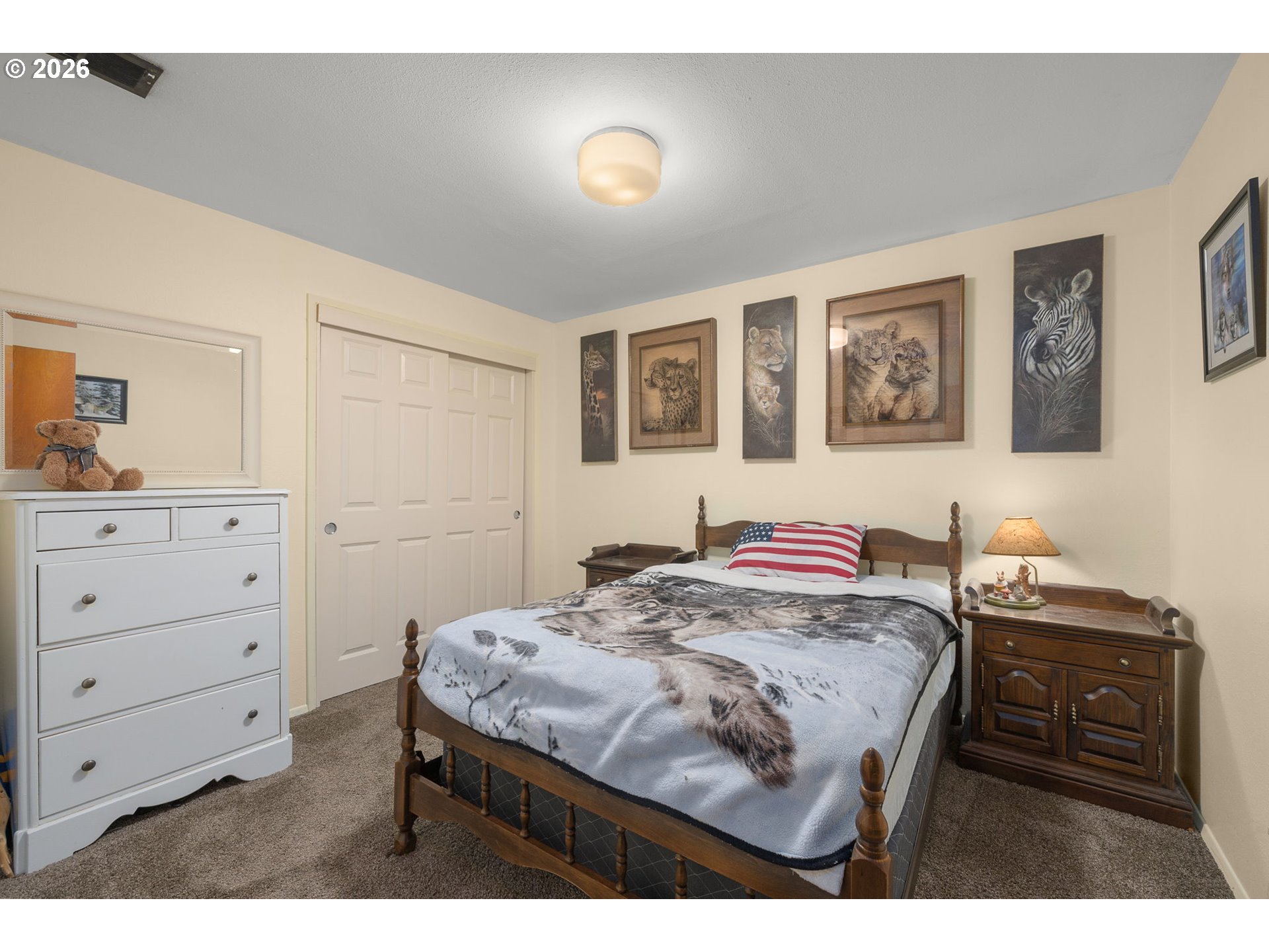 16020 Southeast Monner Road Happy Valley, OR 97086 - Photo 24 of 38 a bedroom with a bed and a dresser