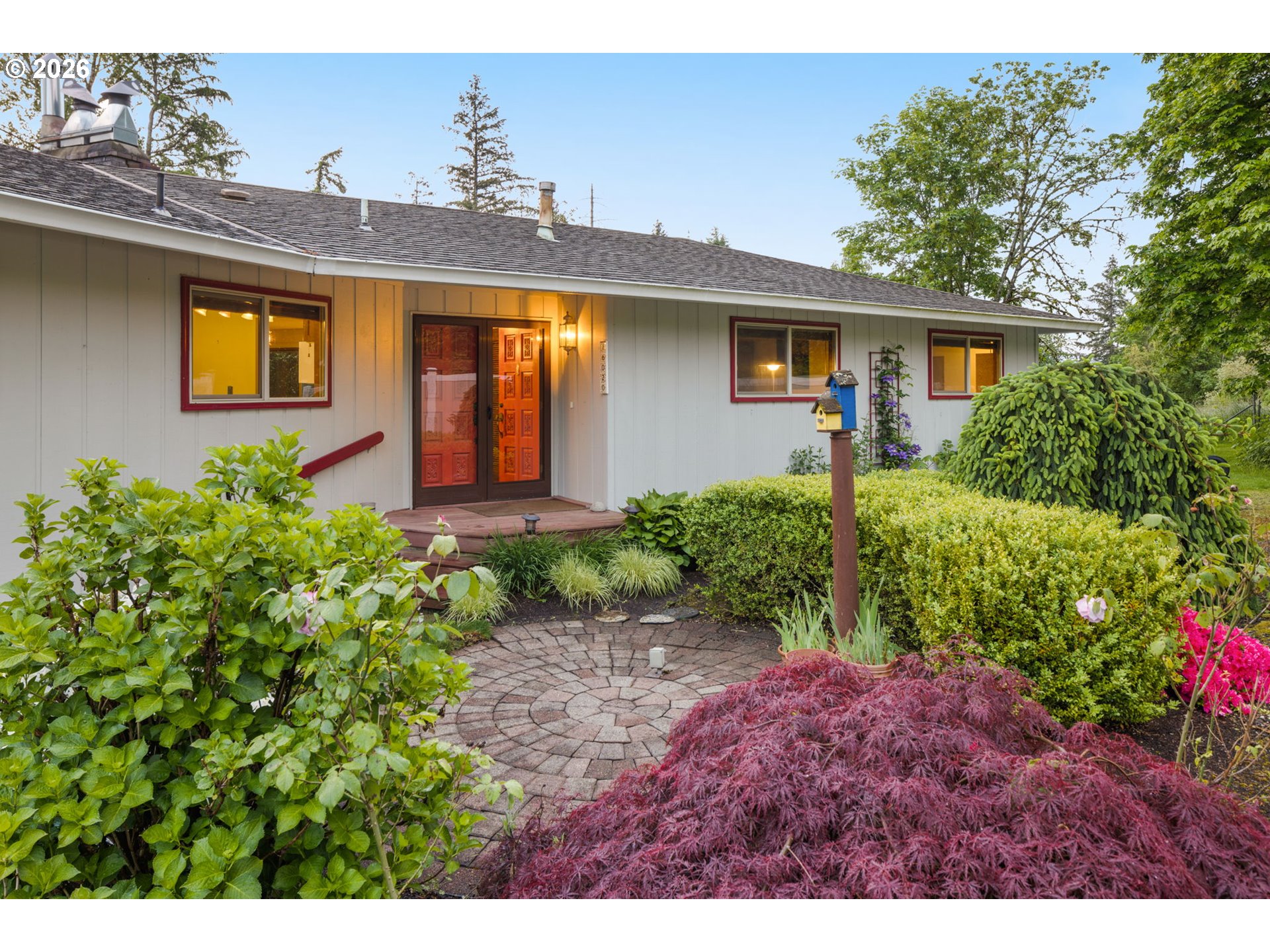 16020 Southeast Monner Road Happy Valley, OR 97086 - Photo 4 of 38 a front view of a house with a yard